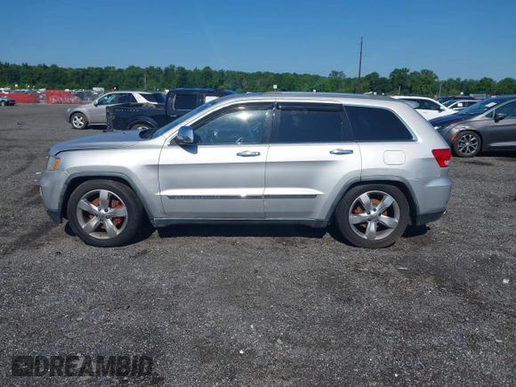 2011 Jeep Grand Cherokee Overland Summit with VIN 1J4RR6GT9BC535985, listed as a IAAI auction lot 42556913 with 108,845 mi miles and . Bid and sale history available at DreamBid. Image 14.