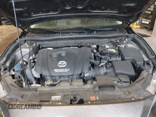 2015 Mazda 3 i Grand Touring z VIN JM1BM1M70F1222597, wystawiony jako IAAI lot #41960987 z przebiegiem 40 841 mil mil oraz . Historia ofert i sprzedaży dostępna na DreamBid. Obrazek 10.