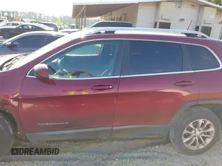 2019 Jeep Cherokee Latitude z VIN 1C4PJLCB9KD325901, wystawiony jako IAAI lot #42234702 z przebiegiem 212 784 mil mil oraz . Historia ofert i sprzedaży dostępna na DreamBid. Obrazek 14.