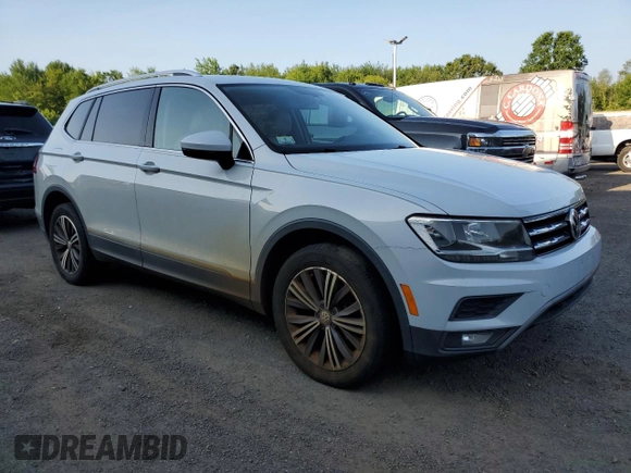 2018 Volkswagen Tiguan SEL z VIN 3VV2B7AXXJM009697, wystawiony jako Copart lot #66335425 z przebiegiem 129 117 mil mil oraz Czysty tytuł • Clean title. Historia ofert i sprzedaży dostępna na DreamBid. Obrazek 4.