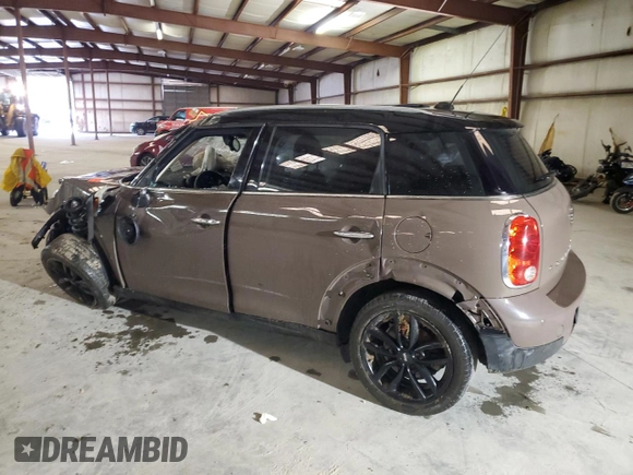 2015 MINI Countryman with VIN WMWZB3C52FWR44105, listed as a Copart auction lot 86780484 with Not Provided miles and Salvage Title. Bid and sale history available at DreamBid. Image 2.