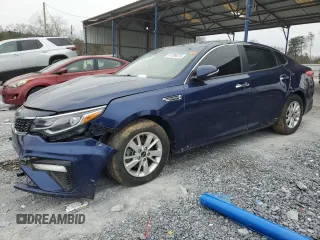 2019 Kia Optima LX z VIN 5XXGT4L30KG279907, wystawiony jako Copart lot #41709075 z przebiegiem 155 475 mil mil oraz Czysty tytuł • Clean title. Historia ofert i sprzedaży dostępna na DreamBid. Obrazek 1.