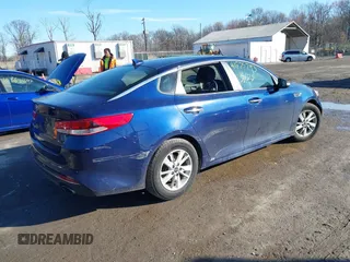 2018 Kia Optima LX with VIN 5XXGT4L33JG191559, listed as a IAAI auction lot 41875793 with 152,479 mi miles. Bid and sale history available at carsss.com. Image 4.