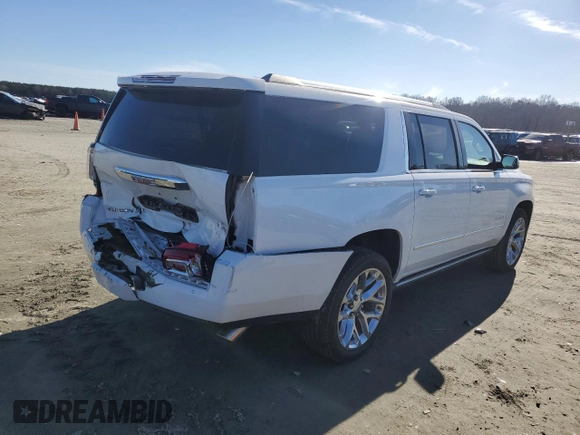 2019 GMC Yukon XL Denali with VIN 1GKS2HKJ2KR103446, listed as a Copart auction lot 88519755 with 77,779 mi miles and Salvage Title. Bid and sale history available at DreamBid. Image 3.