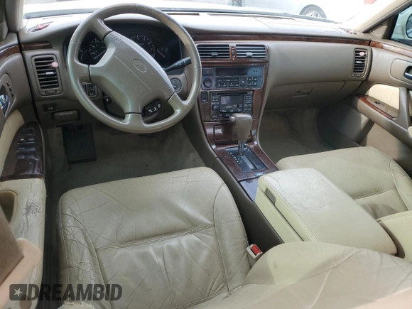 1998 Infiniti Q45 z VIN JNKBY31A8WM403038, wystawiony jako Copart lot #86904484 z przebiegiem 136 142 mil mil oraz Szkoda całkowita • Salvage title. Historia ofert i sprzedaży dostępna na DreamBid. Obrazek 8.