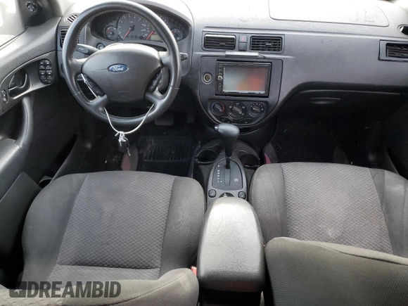 2007 Ford Focus S with VIN 1FAFP37N77W337626, listed as a Copart auction lot 70451294 with 174,068 mi miles and Salvage Title. Bid and sale history available at carsss.com. Image 8.