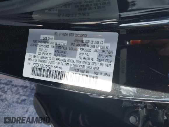 2018 Mazda CX-9 Grand Touring z VIN JM3TCADY8J0221221, wystawiony jako IAAI lot #41644721 z przebiegiem 41 510 mil mil oraz . Historia ofert i sprzedaży dostępna na DreamBid. Obrazek 9.