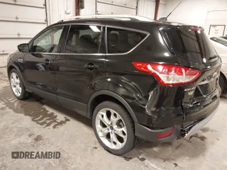2014 Ford Escape Titanium with VIN 1FMCU9J95EUD85537, listed as a IAAI auction lot 41472236 with 154,796 mi miles. Bid and sale history available at carsss.com. Image 3.