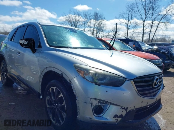 2016 Mazda CX-5 Grand Touring with VIN JM3KE4DY9G0795360, listed as a IAAI auction lot 41933991 with 176,373 mi miles. Bid and sale history available at carsss.com. Image 1.