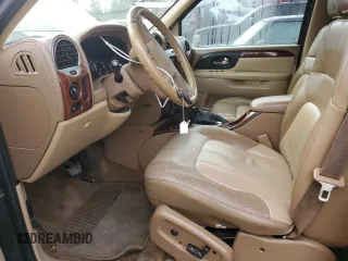 2003 GMC Envoy XL SLT with VIN 1GKES16S036191987, listed as a Copart auction lot 76776604 with 253,889 mi miles and Salvage Title. Bid and sale history available at carsss.com. Image 7.
