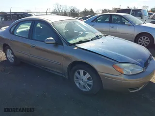 2005 Ford Taurus SEL with VIN 1FAFP56S05A158275, listed as a IAAI auction lot 41869232 with 136,477 mi miles. Bid and sale history available at carsss.com. Image 1.