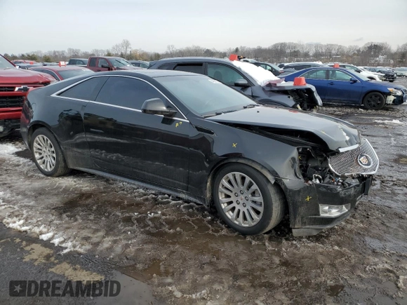2012 Cadillac CTS Premium с VIN 1G6DS1E3XC0117208, выставлен на аукционе Copart как лот 44250735 с пробегом 72 476 миль миль и Списание • Salvage title. История ставок и продаж доступна на DreamBid. Изображение 4.