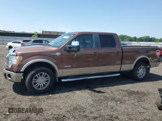 2011 Ford F-150 XLT with VIN 1FTFW1ET3BKD42700, listed as a Copart auction lot 63584565 with 172,623 mi miles and Salvage title. Bid and sale history available at DreamBid. Image 1.