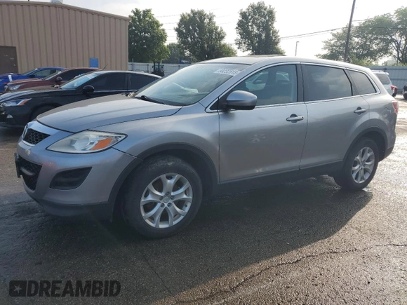 2011 Mazda CX-9 Sport z VIN JM3TB2BA0B0326206, wystawiony jako Copart lot #58232515 z przebiegiem 213 576 mil mil oraz Czysty tytuł • Clean title. Historia ofert i sprzedaży dostępna na DreamBid. Obrazek 1.