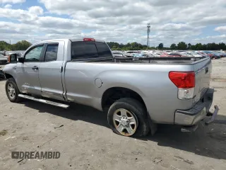 2012 Toyota Tundra 4WD Truck with VIN 5TFCY5F15CX013941, listed as a Copart auction lot 69946754 with 163,228 mi miles and Salvage Title. Bid and sale history available at carsss.com. Image 2.
