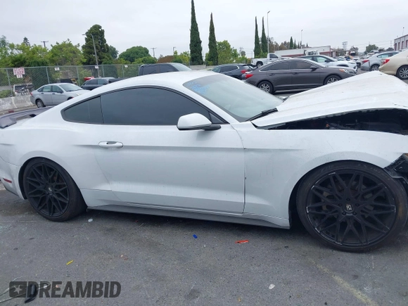 2016 Ford Mustang EcoBoost with VIN 1FA6P8THXG5206192, listed as a IAAI auction lot 42397412 with 117,656 mi miles and . Bid and sale history available at DreamBid. Image 13.