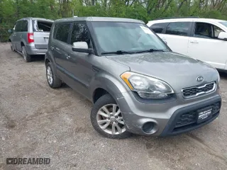 2012 Kia Soul + with VIN KNDJT2A65C7403493, listed as a IAAI auction lot 42095119 with 151,258 mi miles. Bid and sale history available at carsss.com. Image 1.