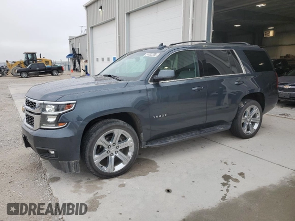 2019 Chevrolet Tahoe LT with VIN 1GNSKBKCXKR212450, listed as a Copart auction lot 54433205 with 119,907 mi miles and Salvage title. Bid and sale history available at DreamBid. Image 1.