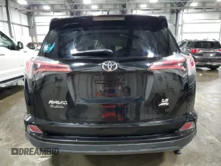 2018 Toyota RAV4 LE with VIN 2T3BFREV6JW763007, listed as a Copart auction lot 58604545 with 107,683 mi miles and Salvage title. Bid and sale history available at DreamBid. Image 6.