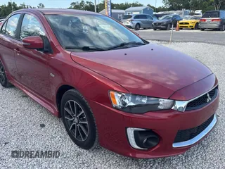 2016 Mitsubishi Lancer SE with VIN JA32V2FW5GU013006, listed as a Copart auction lot 55860815 with 122,815 mi miles and Clean Title. Bid and sale history available at carsss.com. Image 1.