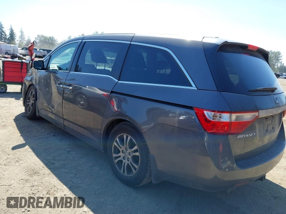 2012 Honda Odyssey EX-L with VIN 5FNRL5H64CB127523, listed as a IAAI auction lot 39818448 with 102,514 mi miles and . Bid and sale history available at DreamBid. Image 3.