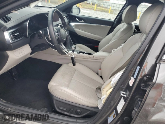 2023 Genesis G70 2.0T with VIN KMTG34TA7PU124188, listed as a Copart auction lot 48004345 with 30,599 mi miles and Salvage Title. Bid and sale history available at carsss.com. Image 7.