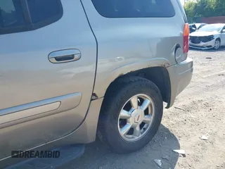 2003 GMC Envoy SLT with VIN 1GKES16S336101568, listed as a IAAI auction lot 40187998 with 185,402 mi miles. Bid and sale history available at carsss.com. Image 13.