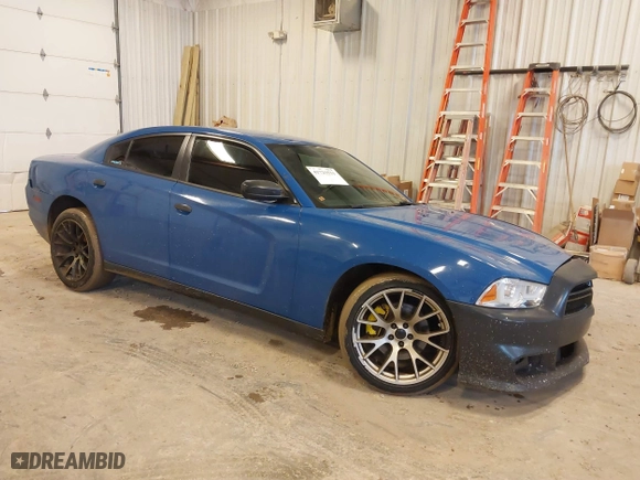 2014 Dodge Charger Police with VIN 2C3CDXAT5EH218901, listed as a IAAI auction lot 41723531 with 216,643 mi miles. Bid and sale history available at carsss.com. Image 1.