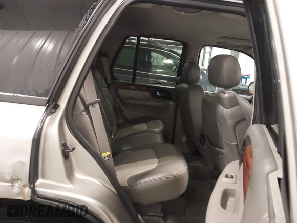 2003 GMC Envoy SLT with VIN 1GKDT13S932395367, listed as a IAAI auction lot 41544810 with 142,012 mi miles. Bid and sale history available at carsss.com. Image 8.