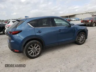 2019 Mazda CX-5 Grand Touring with VIN JM3KFADM1K1600329, listed as a Copart auction lot 51807165 with 51,579 mi miles and Salvage Title. Bid and sale history available at carsss.com. Image 3.