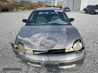 1998 Dodge Neon Highline with VIN 1B3ES42C2WD642821, listed as a Copart auction lot 77038094 with 86,992 mi miles and Salvage Title. Bid and sale history available at carsss.com. Image 5.