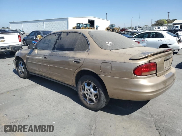 1998 Oldsmobile Intrigue GL z VIN 1G3WS52K1WF373652, wystawiony jako Copart lot #72822084 z przebiegiem 221 028 mil mil oraz Szkoda całkowita • Salvage title. Historia ofert i sprzedaży dostępna na DreamBid. Obrazek 2.