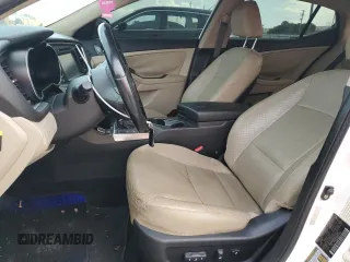 2014 Kia Optima Hybrid EX with VIN KNAGN4AD1E5073961, listed as a Copart auction lot 76757104 with 99,971 mi miles and Clean Title. Bid and sale history available at carsss.com. Image 7.