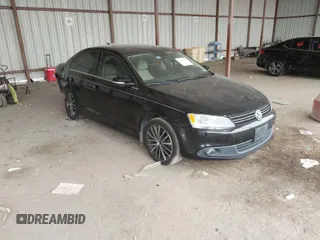 2012 Volkswagen Jetta Sedan SEL w/Sunroof with VIN 3VWLX7AJ5CM379634, listed as a IAAI auction lot 41634048 with 209,586 mi miles. Bid and sale history available at carsss.com. Image 1.