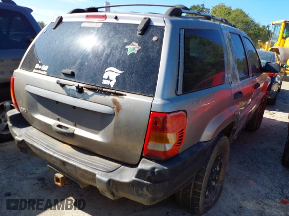 1999 Jeep Grand Cherokee Laredo with VIN 1J4GW58S0XC678864, listed as a IAAI auction lot 37593033 with Not provided miles and . Bid and sale history available at DreamBid. Image 4.