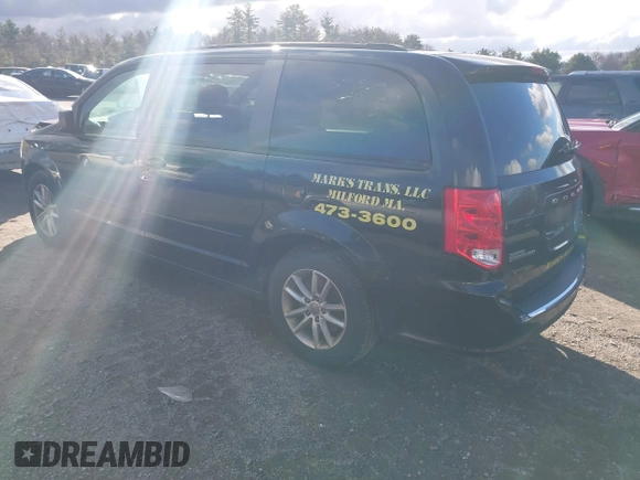 2014 Dodge Grand Caravan SXT with VIN 2C4RDGCG4ER337202, listed as a IAAI auction lot 40781755 with 258,524 mi miles and . Bid and sale history available at DreamBid. Image 3.