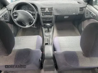 1996 Subaru Legacy Outback with VIN 4S3BG685XT7984194, listed as a Copart auction lot 77999224 with 130,804 mi miles and Salvage title. Bid and sale history available at DreamBid. Image 8.