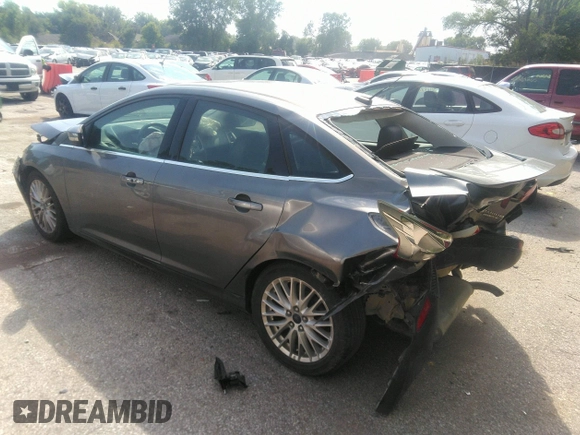 2014 Ford Focus Titanium with VIN 1FADP3J20EL236805, listed as a IAAI auction lot 41708437 with 105,724 mi miles. Bid and sale history available at carsss.com. Image 3.