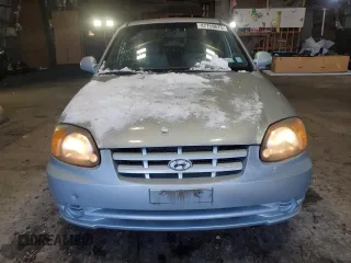 2005 Hyundai Accent GLS with VIN KMHCG45C15U602419, listed as a Copart auction lot 47759675 with 58,133 mi miles and Salvage Title. Bid and sale history available at carsss.com. Image 5.