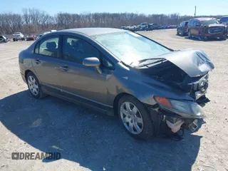 2006 Honda Civic LX with VIN 1HGFA16596L049500, listed as a IAAI auction lot 41801330 with 176,484 mi miles and . Bid and sale history available at DreamBid. Image 1.