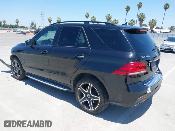 2018 Mercedes-Benz GLE 550e with VIN 4JGDA6DB8JB166698, listed as a IAAI auction lot 42483143 with 77,601 mi miles and . Bid and sale history available at DreamBid. Image 3.