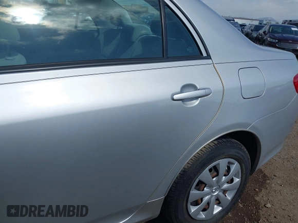 2009 Toyota Corolla with VIN 1NXBU40E49Z060073, listed as a IAAI auction lot 42152619 with 43,540 mi miles. Bid and sale history available at carsss.com. Image 6.