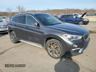2017 BMW X1 xDrive28i with VIN WBXHT3Z32H4A54399, listed as a Copart auction lot 53112515 with 164,260 mi miles and Clean Title. Bid and sale history available at carsss.com. Image 4.