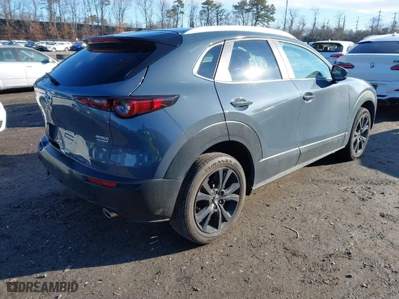 2023 Mazda CX-30 2.5 S Carbon Edition with VIN 3MVDMBCM3PM579345, listed as a IAAI auction lot 41689892 with 18,621 mi miles. Bid and sale history available at carsss.com. Image 4.