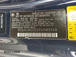 2009 BMW 1 Series 128i with VIN WBAUN13559VH80948, listed as a Copart auction lot 73012384 with 130,694 mi miles and Clean Title. Bid and sale history available at carsss.com. Image 12.