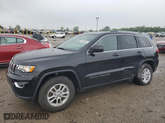 2018 Jeep Grand Cherokee Laredo E with VIN 1C4RJFAG5JC113283, listed as a Copart auction lot 57569595 with 90,897 mi miles and Salvage title. Bid and sale history available at DreamBid. Image 1.