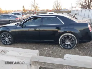 2013 Chrysler 300 with VIN 2C3CCABT8DH644370, listed as a IAAI auction lot 38322039 with 120,874 mi miles. Bid and sale history available at carsss.com. Image 15.