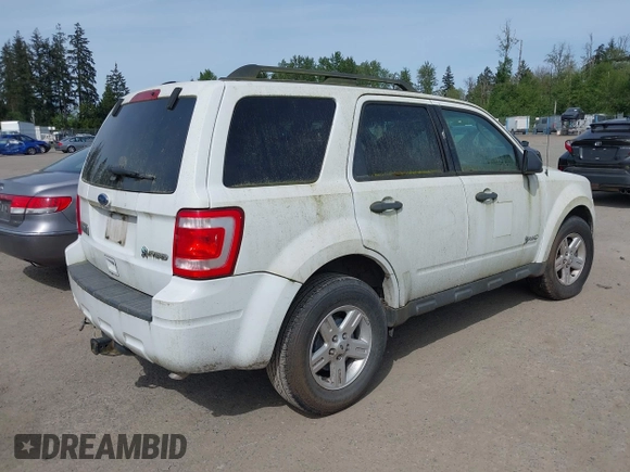 2010 Ford Escape Hybrid with VIN 1FMCU4K35AKC14385, listed as a IAAI auction lot 42182581 with 115,974 mi miles and . Bid and sale history available at DreamBid. Image 4.
