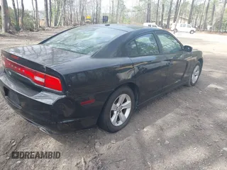 2013 Dodge Charger SE with VIN 2C3CDXBG6DH566853, listed as a IAAI auction lot 41924747 with 212,916 mi miles. Bid and sale history available at carsss.com. Image 4.