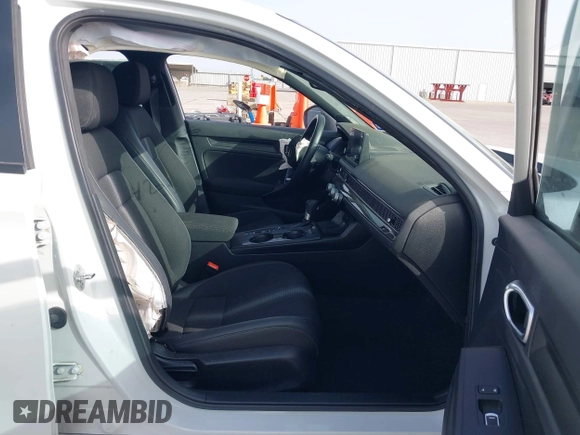 2023 Honda Civic Sport with VIN 2HGFE2F54PH521840, listed as a IAAI auction lot 42258323 with Not provided miles and . Bid and sale history available at DreamBid. Image 5.